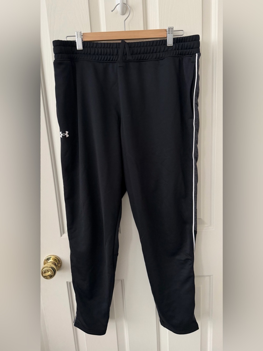 Under Armour Black woman’s jogger with White Side Stripe